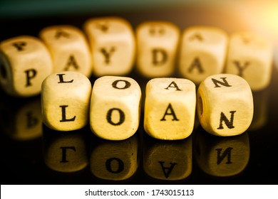 payday loan, inscription on wooden cubes.