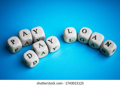 payday loan, inscription on wooden cubes.