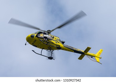 Payerne, Switzerland - August 29, 2014: Yves Rossy also know as Jetman prepares to exit the Eurocopter AS350 helicopter with his jet powered wings on his back. 
