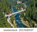 Payette River and Rainbow bridge with deep green forest