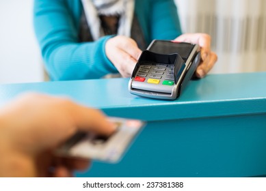 Paying with credit card - Shutterstock ID 237381388
