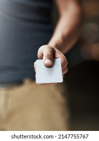 Payment Made Easy. Shot Of A Man Holding Out A Credit Card.