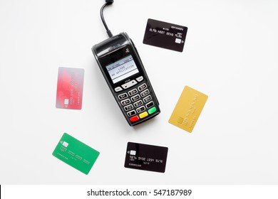 Payment Terminal With Card On White Background Top View