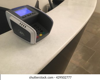 Payment Terminal At Hotel Reception