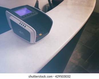 Payment Terminal At Hotel Reception