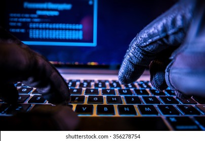 Payments System Hacking. Online Credit Cards Payment Security Concept. Hacker in Black Gloves Hacking the System. - Shutterstock ID 356278754