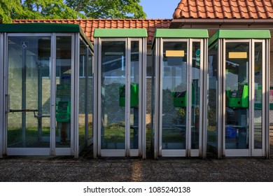 Payphone Booths Sit Empty And Unused At A Japanese Highway Rest Stop