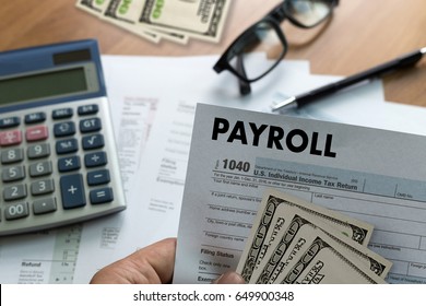 PAYROLL Businessman Working Financial Accounting Concept