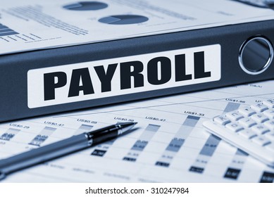 payroll concept on document folder