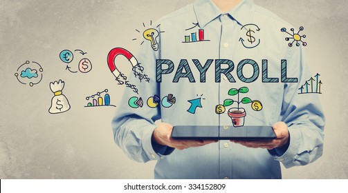 Payroll Concept With Young Man Holding A Tablet Computer 