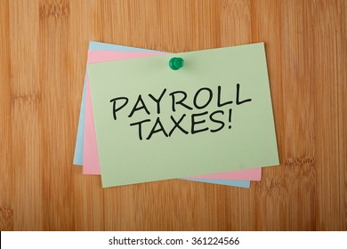 Payroll Taxes! Written On Green Paper Note