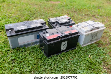 Pb Lead Car Batteries On A Grass In The Nature