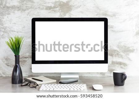 pc computer on workspace table showing blank white screen