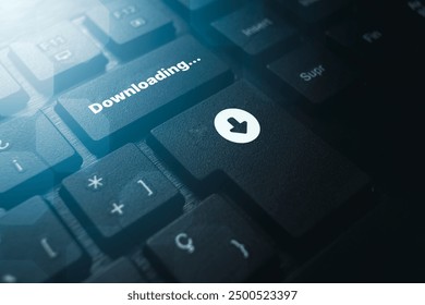 PC keyboard with downloading button. Cloud storage installing software or saving files. Data backup. Cyber security for document downloads.