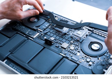 Pc repair service. Computer technician service with laptop on hardware technology background. Maintenance engineer support. Engineer fixing broken computer motherboard