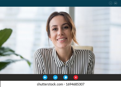Pc screen view, head shot portrait businesswoman makes videocall looks at webcam consult client distantly, confident business lady lead job interview communicates with applicant by video telephony app - Powered by Shutterstock