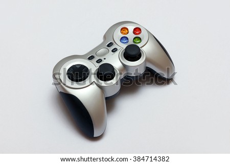 PC wireless game controller (gamepad) on a gray background