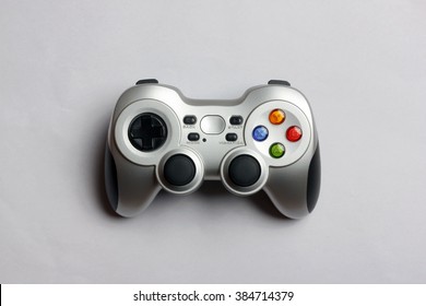 PC wireless game controller on a gray background, top view
