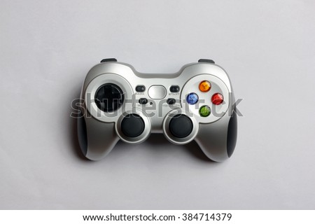 PC wireless game controller on a gray background, top view