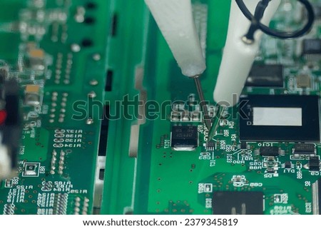 The PCB board checking process by high speed automatic robot system. The high technology electronic component manufacturing process by robotic system. 