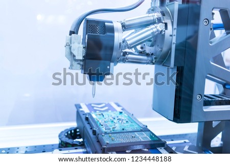PCB Processing on CNC machine working in factory