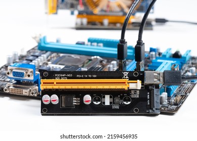 PCI-E Riser card for a GPU cryptocurrency mining rig. PCI-E Riser card is an expansion card used to extend a slot for computer mainboard.