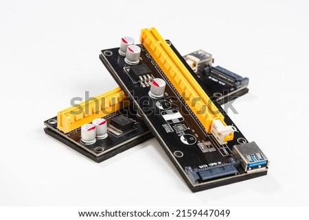 PCI-E Riser card for a GPU cryptocurrency mining rig. PCI-E Riser card is an expansion card used to extend a slot for computer mainboard.