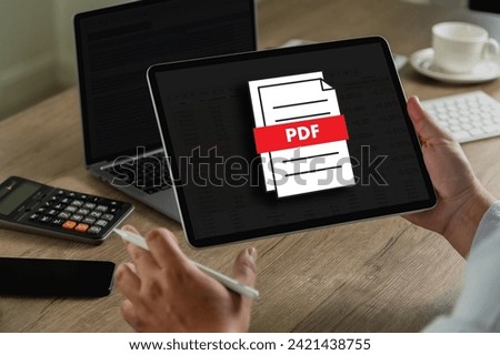 PDF button on screen Laptop computer converting process of document to another format Convert PDF files with online programs.