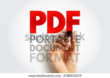 PDF PORTABLE DOCUMENT FORMAT written in large bold letters with a hand marker, concept of electronic file sharing, reading, and digital archiving in computer and office systems