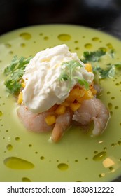 Pea And Corn Green Cream Soup With Shrimps And Expensive Cheese In A Fine Dining Restaurant, Close Up, Macro Texture