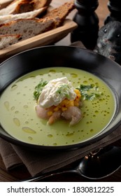 Pea And Corn Green Cream Soup With Shrimps And Expensive Cheese In A Fine Dining Restaurant, Close Up, Macro Texture