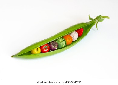A pea pod containing fruits and vegetables 