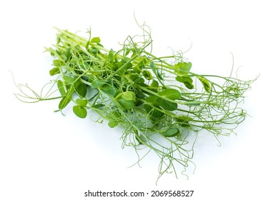 Pea Shoots With Tendrils Lying Flat, Isolated On White