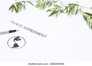 Peace Agreement Concept Metaphor With Olive Branch.Includes Copy Space.