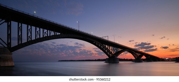 Peace Bridge At Sunset, Buffalo, NY. An International Border Crossing Connecting United States And Canada.