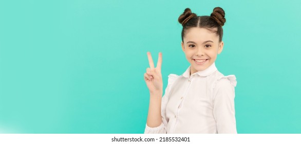 Peace Maker. School Age Kid Show V Sign. Happy Kid Blue Background. Child Face, Horizontal Poster, Teenager Girl Isolated Portrait, Banner With Copy Space.