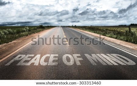 Peace of Mind written on rural road