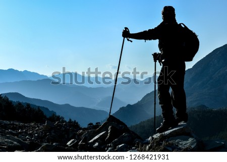 Similar – Hiker photographs the landscape