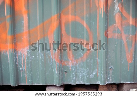 A peace sign painted in graffiti