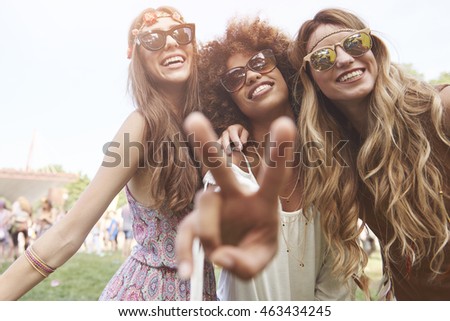 Peace sign and three friends