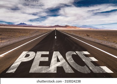 Peace written on desert road