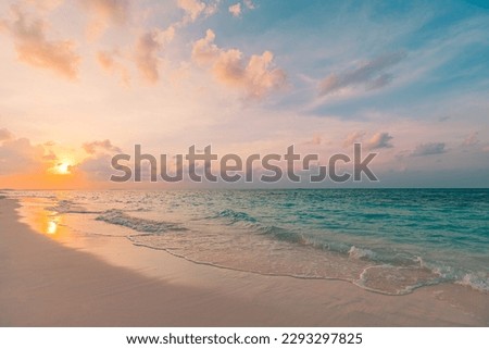 Peaceful closeup sea sand beach. Beautiful nature landscape. Inspire tropical beach seascape wave horizon. Orange golden sunset sky calm tranquil relaxing summer. Vacation travel holiday concept