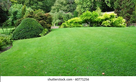 Peaceful Garden With A Freshly Mown Lawn