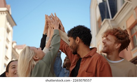 Peaceful protesters give five each other. Social justice and peaceful protesting racial injustice. - Powered by Shutterstock