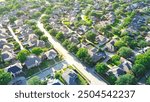 Peaceful residential street in Riverbend North neighborhood row of upscale suburban houses with swimming pools in West Plano, urban sprawl suburbs Dallas Fort Worth metroplex, Texas, aerial view. USA