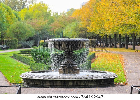 Peaceful scenery with fountain in regent's park of London