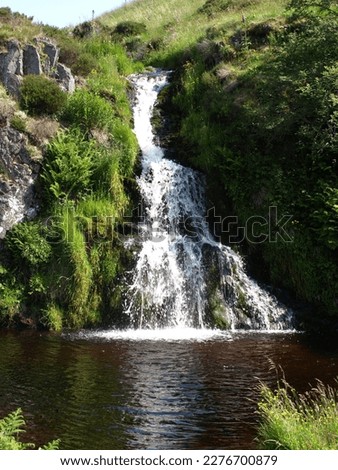 Peaceful waterfall of Davidson's Linn near Uswayford, Coquet Valley, Northumberland, England