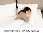 Peaceful Woman Sleeping Comfortably In A Bright Bedroom, Emphasizing Rest, Relaxation And Bedroom Coziness, In A Modern Home Setting