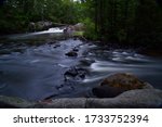 Peacefull waterfall image along the Pike River in Marinette County Wisconsin in Mid Summer near the town of Amberg.  The park have a number of peacefull and calming scenic falls along the park trail