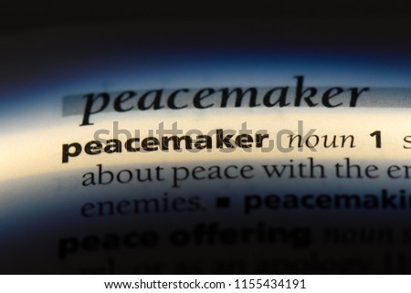 peacemaker word in a dictionary. peacemaker concept.